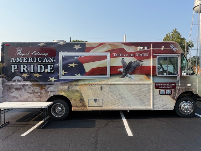 Roy-el Catering's American Pride food truck at a community event.