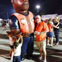 Community members enjoying a nighttime festival event.