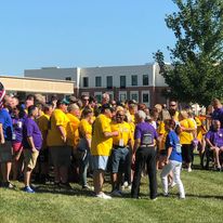 Local heroes and supporters gathered for a community walk.